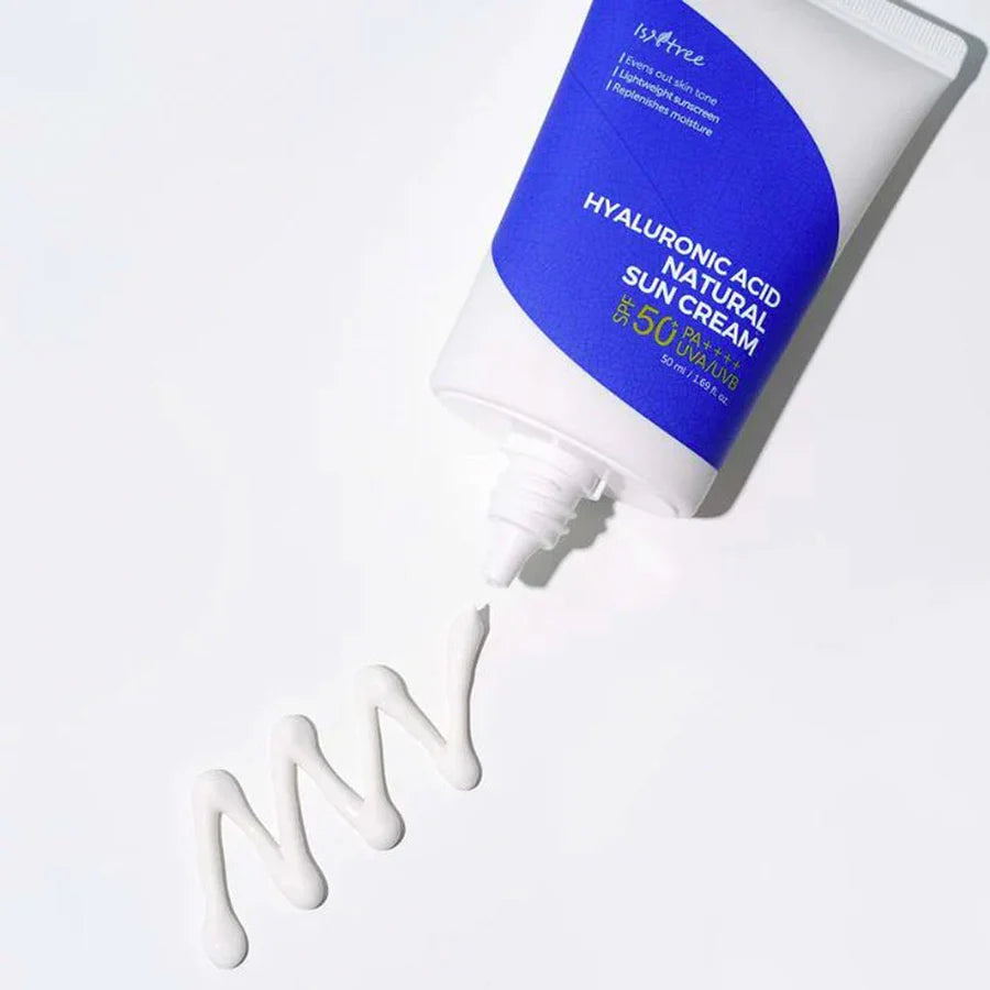 Isntree SPF 50 moisturizer with hyaluronic acid in white and blue tube with cream squeezed out