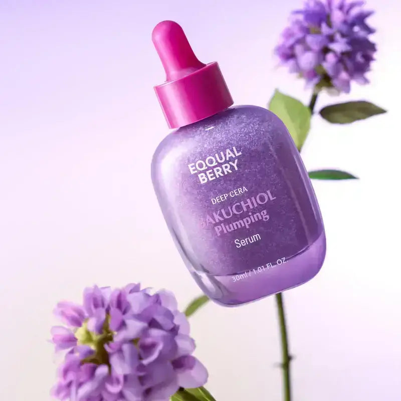 Zuzu Aura Bakuchiol Serum in purple bottle with dropper for plumping and rejuvenating skin