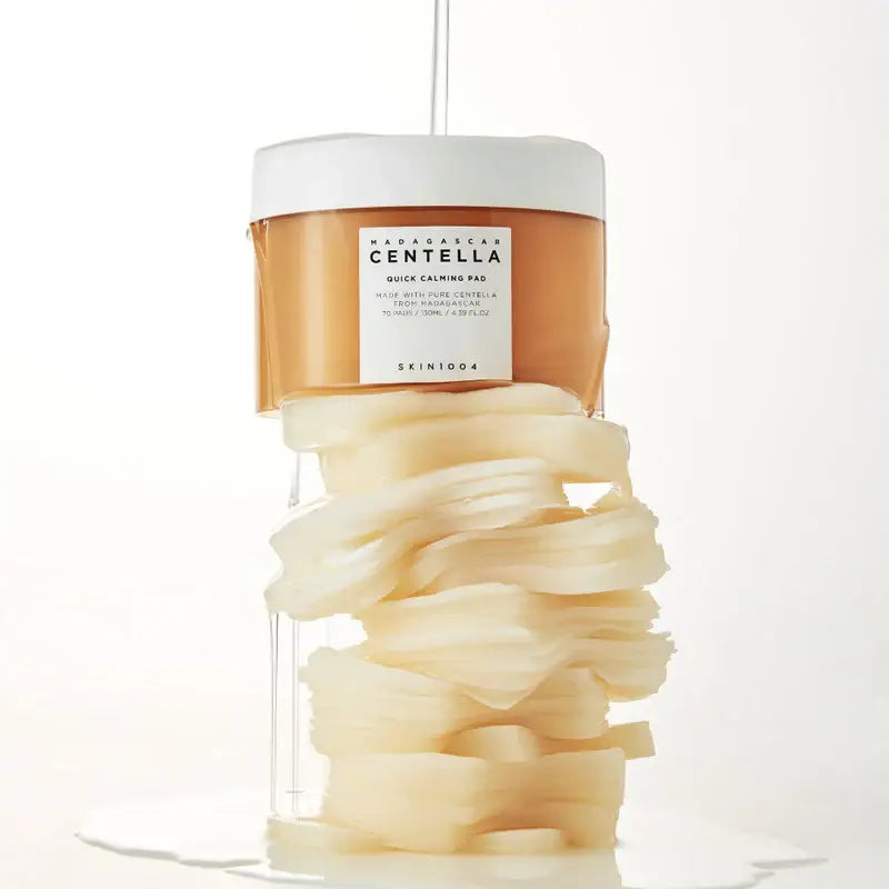 Mixsoon Centella toner pad in a clear jar with calming ingredients for skin hydration